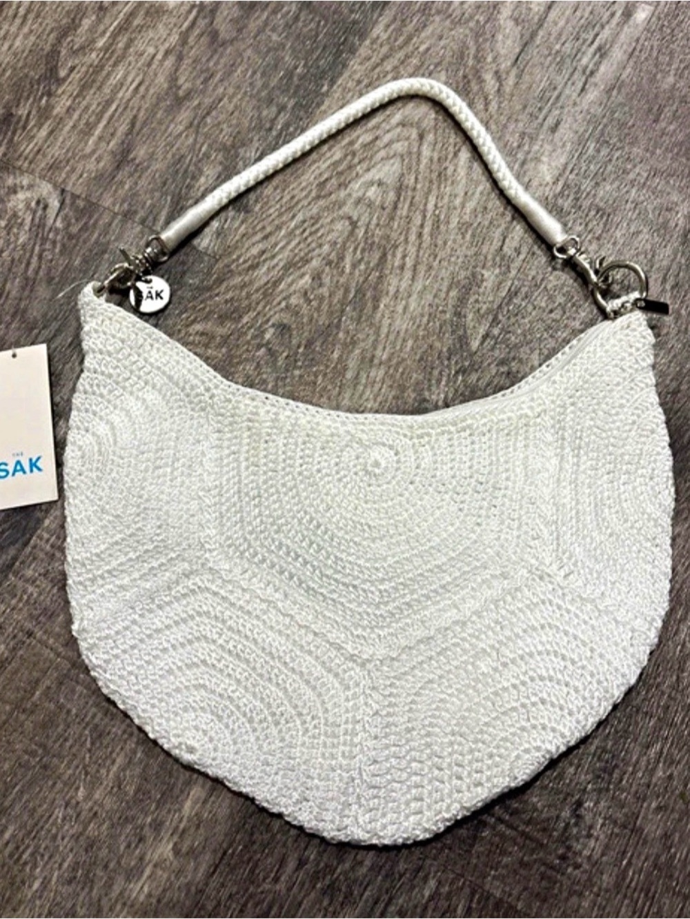 The Sak White Crochet Crescent Shoulder Bag